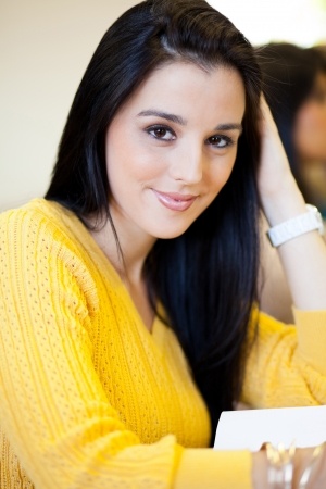 attractive girl in yellow sweater